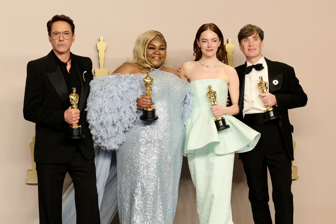 HOLLYWOOD, CALIFORNIA - MARCH 10: (L-R) Robert Downey Jr., winner of the Best Supporting Actor award for 